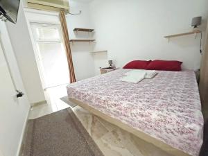 Cama ou camas em um quarto em Java apartments - S & J