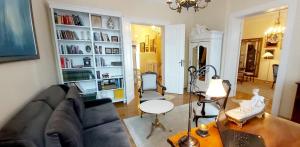 a living room with a couch and a table at Apartament ASSER - 110 m2 komfortu in Pszczyna