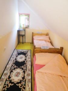 Postel nebo postele na pokoji v ubytování Kuća Dragović Apartman