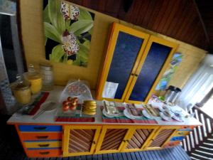 a toy kitchen with a table with food on it at Repousada Sana in Sana