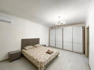 Posteľ alebo postele v izbe v ubytovaní Most City Area De-Lux Apartment