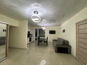 Televízia a/alebo spoločenská miestnosť v ubytovaní Most City Area De-Lux Apartment
