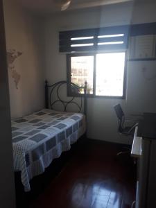 Ένα ή περισσότερα κρεβάτια σε δωμάτιο στο Hosts in Rio Homestay +19 φωτογραφίες