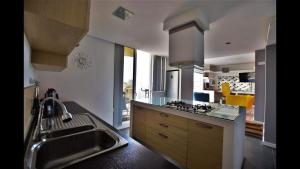 Kuchyň nebo kuchyňský kout v ubytování Riviera Penthouse