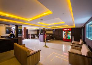 The lobby or reception area at Plaza Hotel Trichy