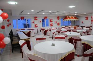 A restaurant or other place to eat at Plaza Hotel Trichy