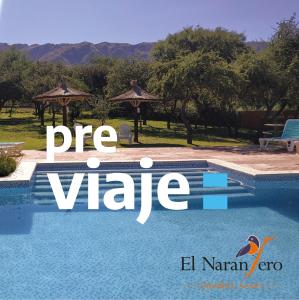 a sign that says free vibe next to a swimming pool at El Naranjero Apart in Carpintería