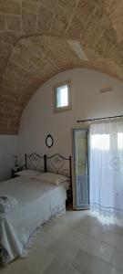 Postel nebo postele na pokoji v ubytování Asylum Amicorum Bed & Breakfast