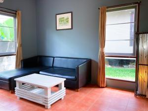 Posezení v ubytování Flora Ville-SHA PLUS