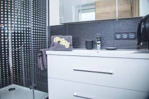 Koupelna v ubytování ROCHUS APPARTEMENTS + 20 fotografií