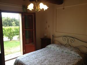 Katil atau katil-katil dalam bilik di Toscana Relax Gambassi Terme