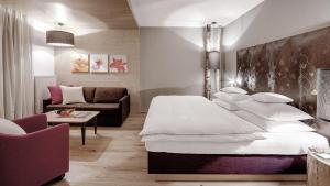 Letto o letti in una camera di INNs HOLZ