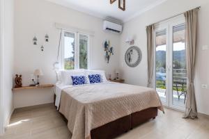 Ένα ή περισσότερα κρεβάτια σε δωμάτιο στο Artemis' Garden