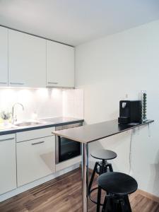 Kuchyň nebo kuchyňský kout v ubytování Studio Omis + 6 fotografií