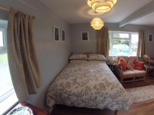 Katil atau katil-katil dalam bilik di Cheltenham Studio Apartment +30 gambar