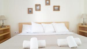 Postel nebo postele na pokoji v ubytování Mare Mare Mykonos + 33 fotografií