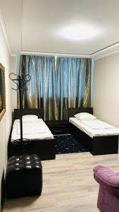 Postel nebo postele na pokoji v ubytování Hotel Style BESSARABIA
