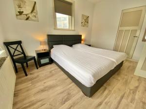 Cama o camas de una habitación en Apartment Van Kinsbergen
