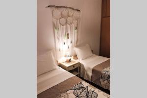 Postel nebo postele na pokoji v ubytování Apartment 95 m2, center of Sitia, WiFi, 350m beach