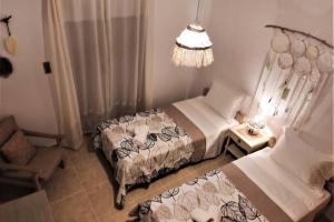 Postel nebo postele na pokoji v ubytování Apartment 95 m2, center of Sitia, WiFi, 350m beach