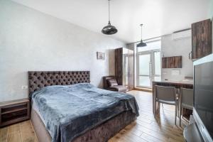 Postel nebo postele na pokoji v ubytování Boomerang apart-apart hotel