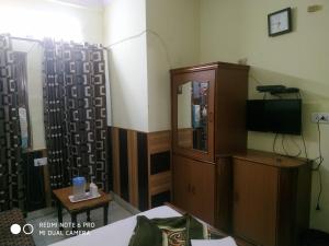 TV a/nebo společenská místnost v ubytování Mother Palace
