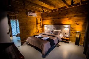 Giường trong phòng chung tại Woodstock Villa