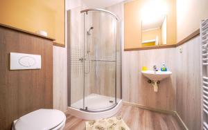 Kúpeľňa v ubytovaní Apartmány Karmon Park