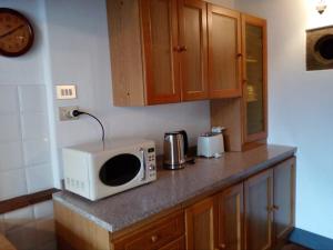 Kuchyň nebo kuchyňský kout v ubytování il nido APUS Architect Apartment