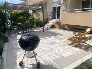 Patio alebo iná vonkajšia časť ubytovania Albatros
