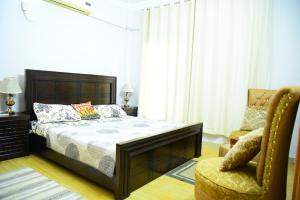 Srinagar Homes客房内的一张或多张床位