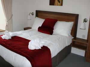 Letto o letti in una camera di Ravine Hotel