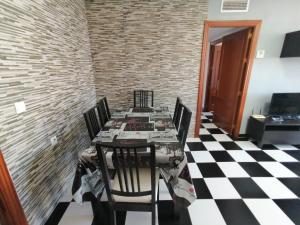 Telewizja i/lub zestaw kina domowego w obiekcie Apartamento Juan Bautista