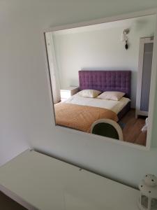 A bed or beds in a room at Lawenda-Strefa Ciszy