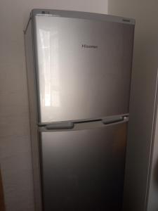 a refrigerator with the words preference written on it at Royal Stina Hotel-style with Swimming pool in Johannesburg