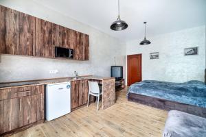Kuchyň nebo kuchyňský kout v ubytování Boomerang apart-apart hotel