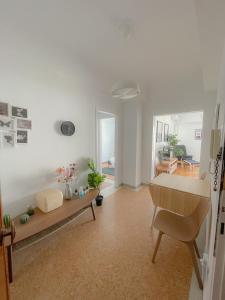 a living room with a couch and a table at Acropolis Exceptional View II in Athens