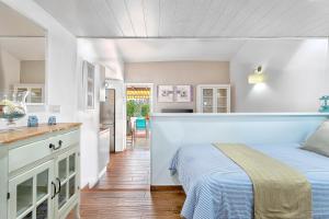 Posteľ alebo postele v izbe v ubytovaní ARGUINEGUIN, BUNGALOWS LOS CANARIOS