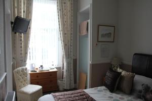 Кровать или кровати в номере Glenbervie Guest House