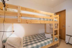 a bunk bed room with two bunk beds at Caparica Beach Apartment by HOST-POINT in Costa da Caparica