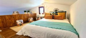 Posteľ alebo postele v izbe v ubytovaní ARGUINEGUIN, BUNGALOWS LOS CANARIOS