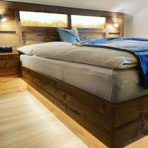 Postel nebo postele na pokoji v ubytování Tiroler Alpblick Appartements