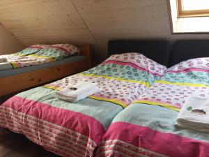 Postel nebo postele na pokoji v ubytování Guest Home "Būriņi"