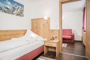 Voodi või voodid majutusasutuse Hotel Kirchlerhof toas