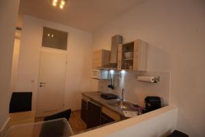 Кухня или кухненски бокс в City Appartements Weiz