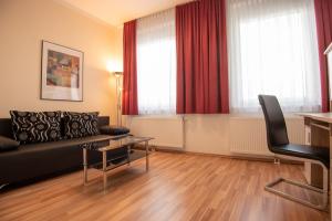 Кът за сядане в City Appartements Weiz