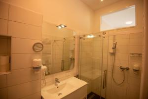 Kúpeľňa v ubytovaní City Appartements Weiz + 26 fotografií