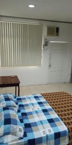 Cama o camas de una habitación en Boel Boutique Suite en Guayaquil