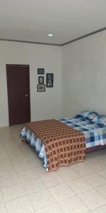 Ένα ή περισσότερα κρεβάτια σε δωμάτιο στο Boel Boutique Suite en Guayaquil