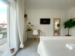 Voodi või voodid majutusasutuse Pathos Guest House toas